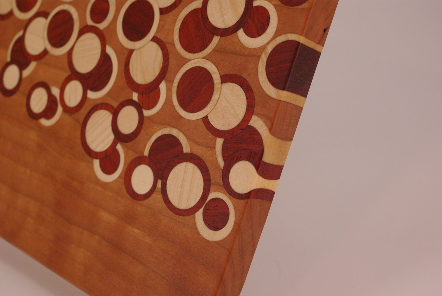 Cherry Board with Paduk and Maple Inverse Dots